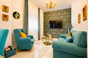A television and/or entertainment centre at Apartamentos Cruz de San Andrés