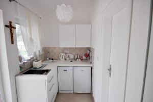 Η κουζίνα ή μικρή κουζίνα στο Holiday Home T