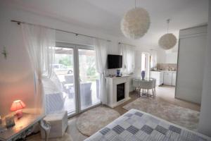 Ένα ή περισσότερα κρεβάτια σε δωμάτιο στο Holiday Home T