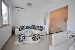 Χώρος καθιστικού στο Holiday Home M