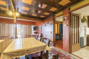 a dining room with a table in a room at Apartment Alenka in Novigrad Istria