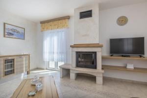 TV a/nebo společenská místnost v ubytování Villa Mateja