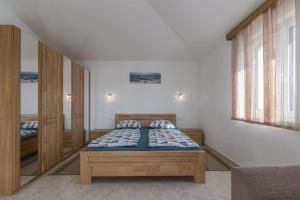 Postel nebo postele na pokoji v ubytování Villa Mateja + 37 fotografií