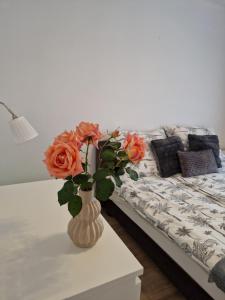 Posteľ alebo postele v izbe v ubytovaní Balaton Apartman Füred