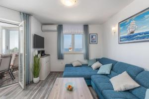 TV a/nebo společenská místnost v ubytování Apartment Marjan