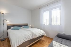 Postel nebo postele na pokoji v ubytování Apartment Marjan