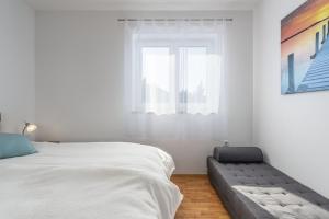 Postel nebo postele na pokoji v ubytování Apartment Marjan