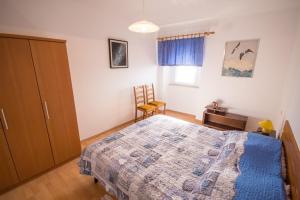 Katil atau katil-katil dalam bilik di Apartment Bencic
