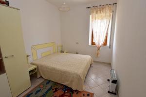 Katil atau katil-katil dalam bilik di Appartamento Vacanza
