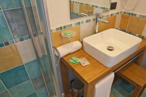 Koupelna v ubytování Hotel Cala Reale