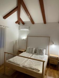 Ένα ή περισσότερα κρεβάτια σε δωμάτιο στο Villa Leonore mit beheizbarem Pool +11 φωτογραφίες