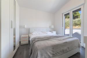 Ένα ή περισσότερα κρεβάτια σε δωμάτιο στο Villa Bamboo