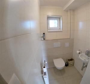 Koupelna v ubytování Apartmány Dívčice + 12 fotografií