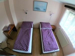 Postel nebo postele na pokoji v ubytování Apartmány Dívčice