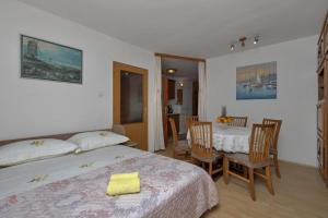 Posteľ alebo postele v izbe v ubytovaní Sun and Sea 3-2 apartment
