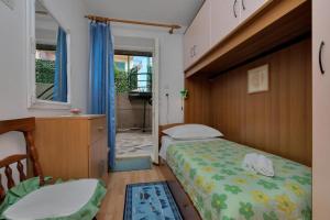 Posteľ alebo postele v izbe v ubytovaní Sun and Sea 3-2 apartment
