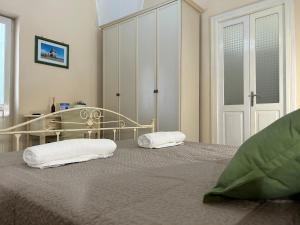 Postel nebo postele na pokoji v ubytování Meta Salento Rooms