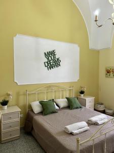 Postel nebo postele na pokoji v ubytování Meta Salento Rooms