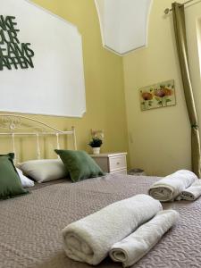 Postel nebo postele na pokoji v ubytování Meta Salento Rooms