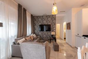 A television and/or entertainment centre at Apartamentos Cruz de San Andrés