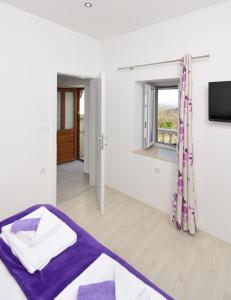 Postel nebo postele na pokoji v ubytování Apartment Borovac