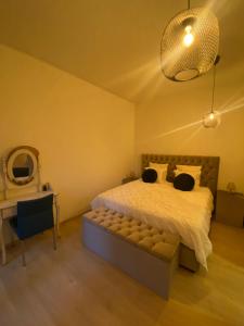 Postel nebo postele na pokoji v ubytování B&B Art and Sleep