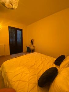 Voodi või voodid majutusasutuse B&B Art and Sleep toas