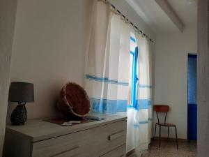 Postel nebo postele na pokoji v ubytování Dommu Biddasusu