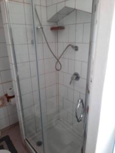 Koupelna v ubytování Dommu Biddasusu