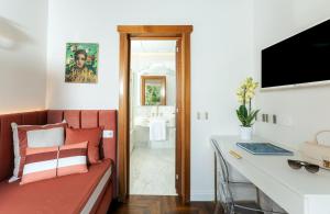 TV a/nebo společenská místnost v ubytování Villa Antiche Mura Relais + 31 fotografií