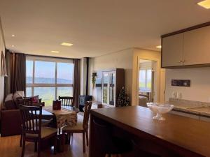 Η κουζίνα ή μικρή κουζίνα στο Apartamentos Residencial Toscano by Achei Gramado