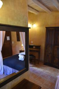Postel nebo postele na pokoji v ubytování Odos Oneiron Boutique Hotel