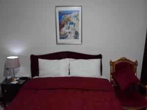 En eller flere senge i et værelse på New Boutique Apartment Egypt