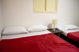 Cama o camas de una habitación en Apartahotel Zabdi