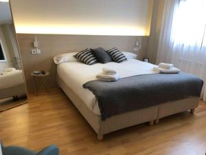Posteľ alebo postele v izbe v ubytovaní Yuhom, casas con alma. Xacedos 5