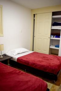 Cama o camas de una habitación en Apartahotel Zabdi