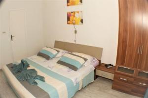 Postel nebo postele na pokoji v ubytování A1 tončev apartman