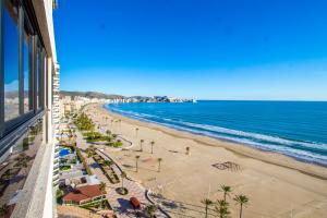 a view of the beach from a building at ESPACIO 16 - Primera LINEA PLAYA in Cullera