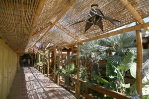 a building with a bat sculpture hanging from the ceiling at Oasi Beach Hotel in Vieste