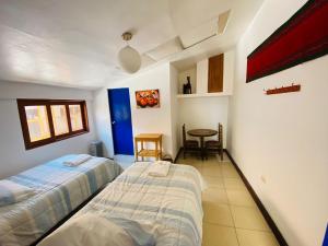 Postel nebo postele na pokoji v ubytování Flying Dog Hostel Cusco