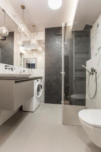 Koupelna v ubytování Apartament przy centrum i dworcu