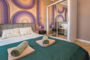 Postel nebo postele na pokoji v ubytování Apartament przy centrum i dworcu