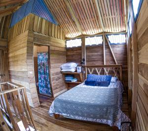 Giường trong phòng chung tại Oski Lodge, Rain Forest Rincón de la Vieja +79 ảnh