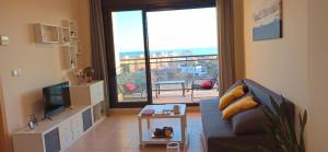 Televízia a/alebo spoločenská miestnosť v ubytovaní Apartamento Aguamarina - Playa Moncofa