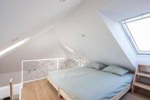 Katil atau katil-katil dalam bilik di Echo Homespaces Marquês