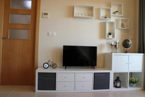 Televízia a/alebo spoločenská miestnosť v ubytovaní Apartamento Aguamarina - Playa Moncofa