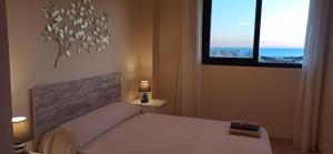 Posteľ alebo postele v izbe v ubytovaní Apartamento Aguamarina - Playa Moncofa