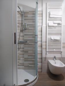 a bathroom with a shower and a sink at B&B La Dolce Sosta in Fonni +56 photos