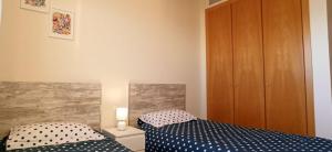 Posteľ alebo postele v izbe v ubytovaní Apartamento Aguamarina - Playa Moncofa