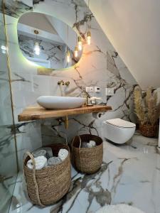 Phòng tắm tại Silesia Apartments Ustron H125